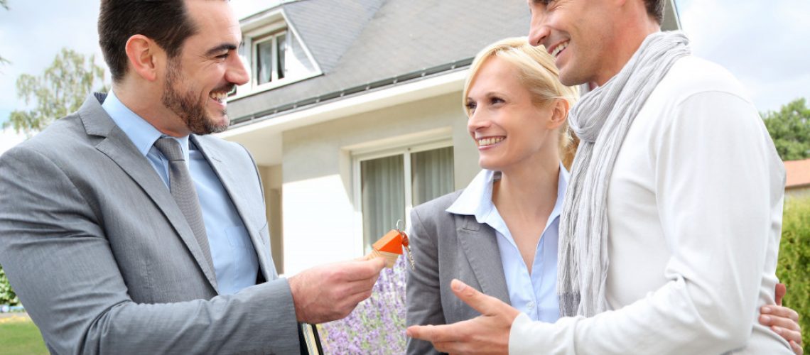 businesspeople buying a property